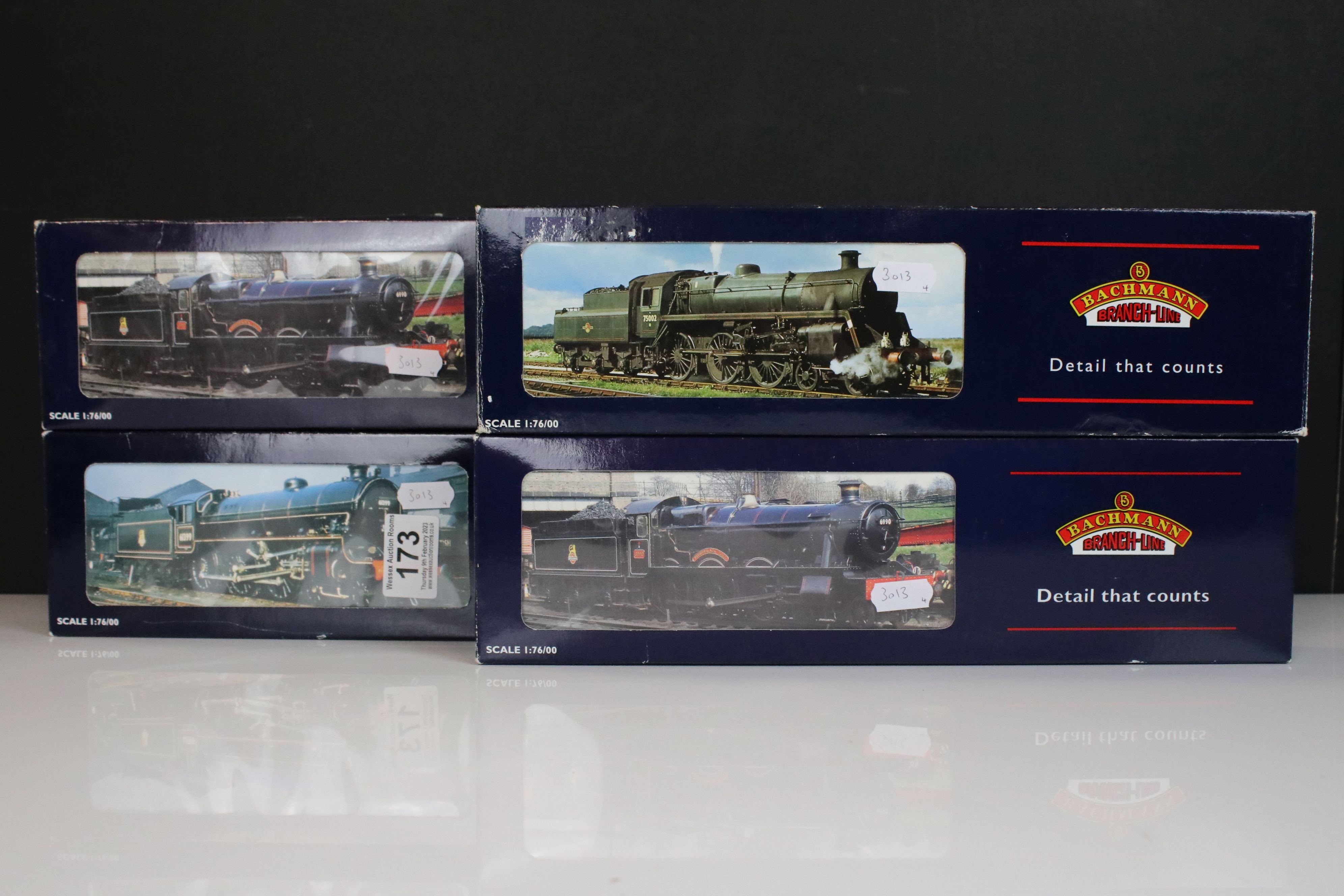 Four boxed Bachmann OO gauge locomotives to include 31102A Standard 4MT 75072 BR Lined black e/crest