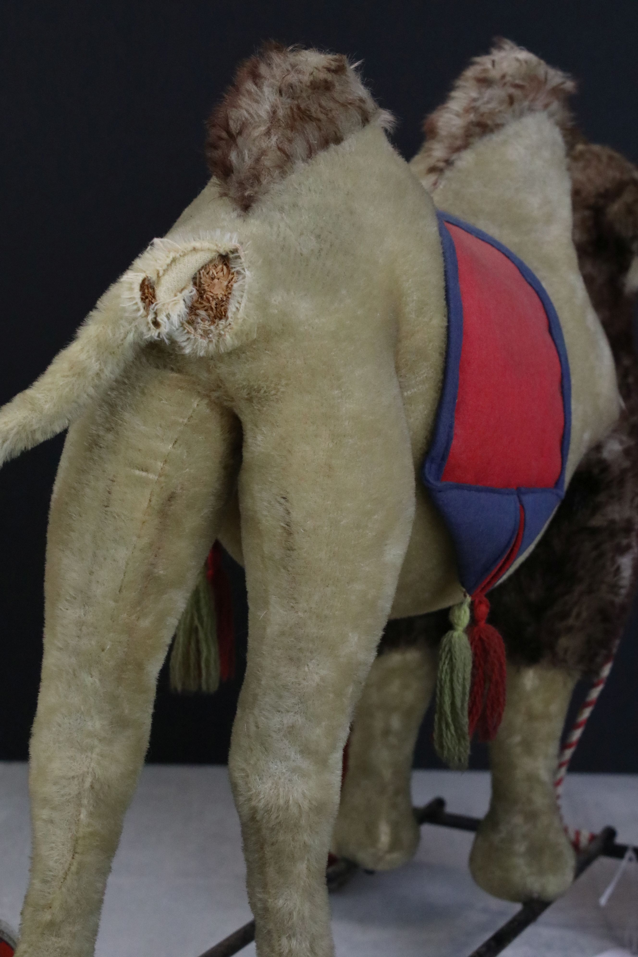 Early to Mid 20th century Steiff mohair camel on wheels, straw filled, glass eyes, standing on a - Image 3 of 5
