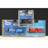 Three boxed/carded Bachmann OO gauge Thomas & Friends locomotives to include 58743 James, 58802