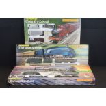 Three boxed Hornby OO gauge train sets to include R671 Country Local, R682 The Blue Streak and