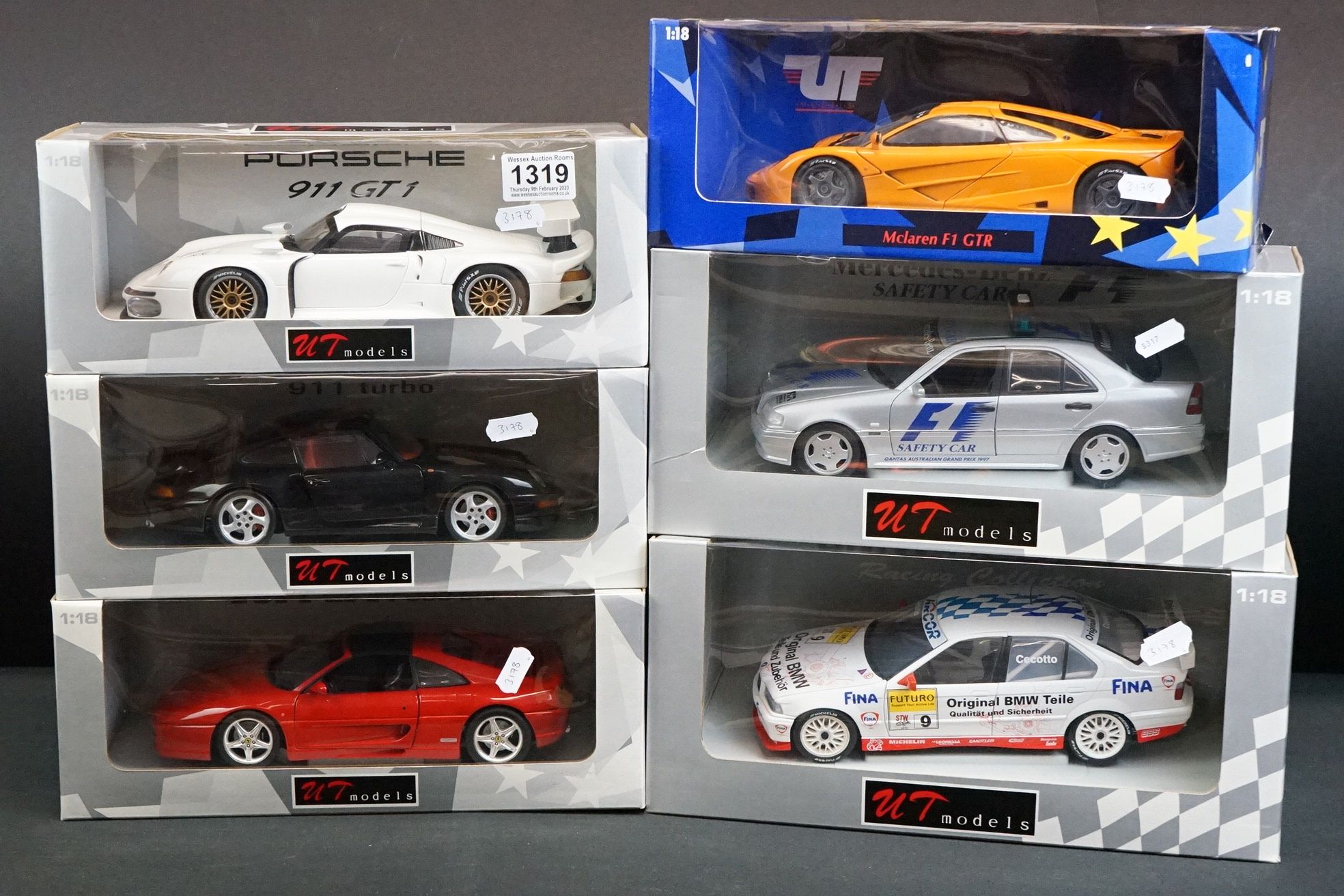 Six boxed 1/18 UT Models diecast models to include McLaren F1 GTR 530 151890, Porsche 911 GT1,