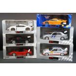 Six boxed 1/18 UT Models diecast models to include McLaren F1 GTR 530 151890, Porsche 911 GT1,
