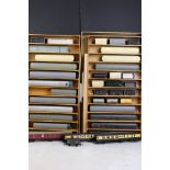38 OO gauge items of rolling stock featuring coaches, wagons and trucks, mainly Triang examples (2