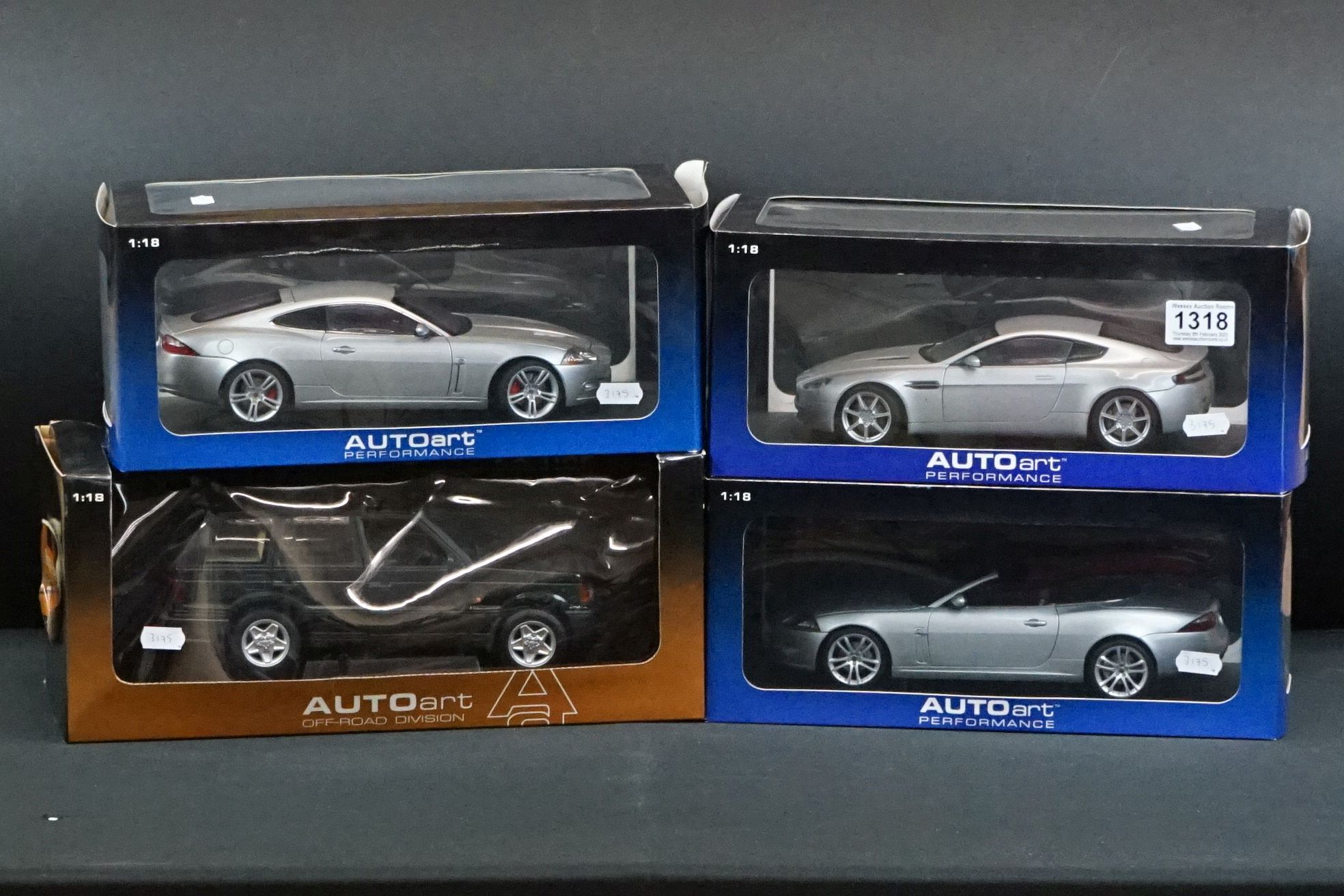 Four boxed 1/18 AutoArt diecast models to include 3 x Performance (Jaguar XK Convertible, Jaguar XKR