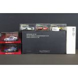 Seven Boxed / cased diecast model racing cars to include an Autoart Signature Nissan GT-R FIA GT1