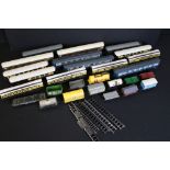 30 OO gauge items of rolling stock to include coaches, tankers and trucks to include Hornby & Triang