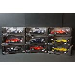 Nine boxed 1/18 Mattel Hot Wheels Racing diecast models to include 54626 Michael Schumacher, 54624