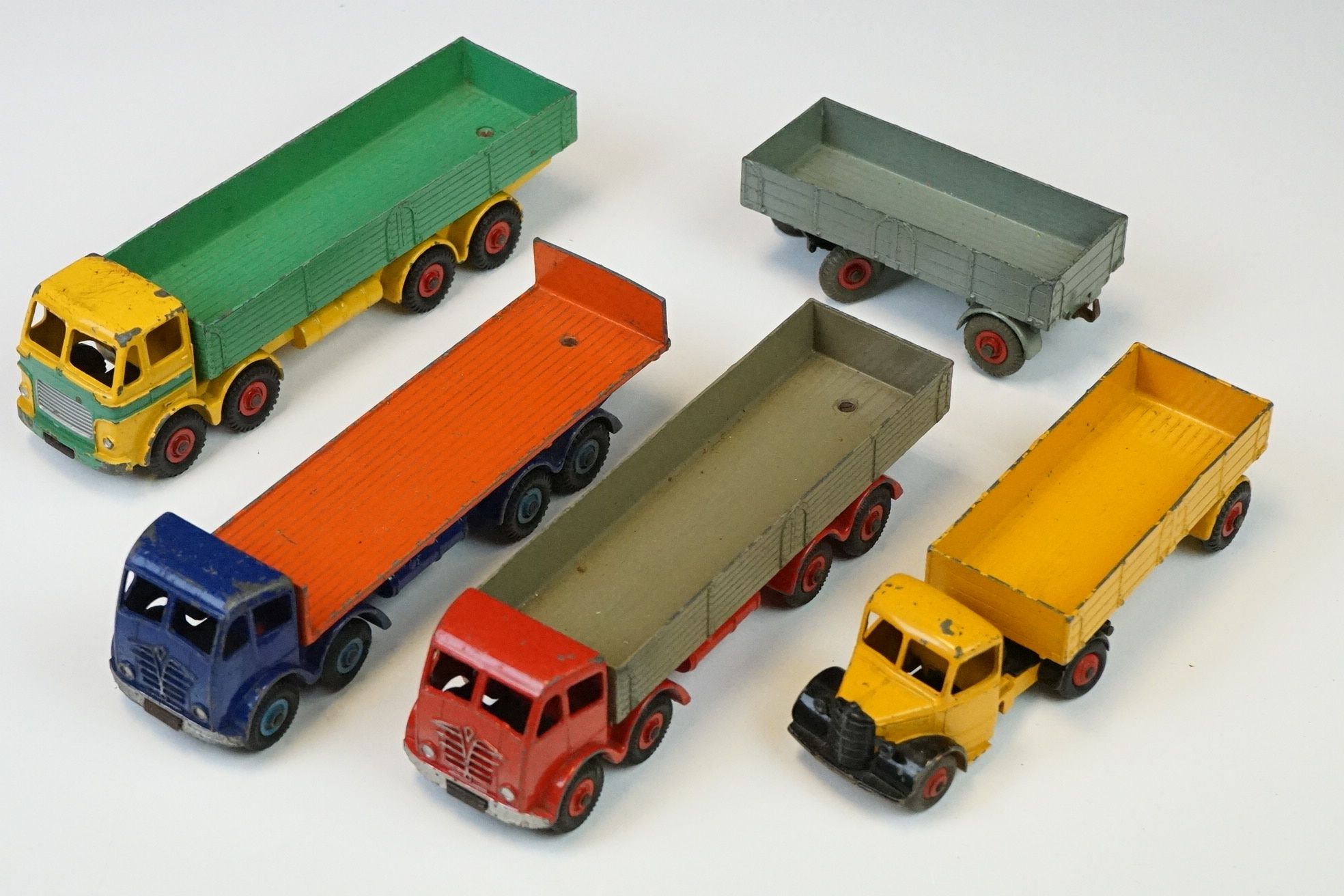 Five mid 20th C play worn Dinky diecast models to include 2 x Foden (variants), Leyland Octopus, 651