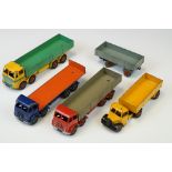 Five mid 20th C play worn Dinky diecast models to include 2 x Foden (variants), Leyland Octopus, 651