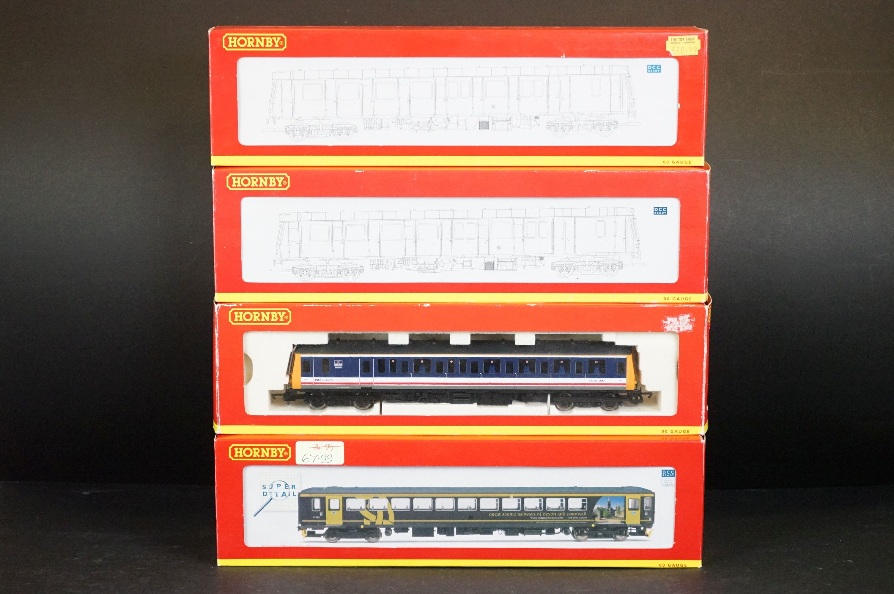 Four boxed Hornby OO gauge engines / DMU to include R2866 Wessex Trains Class 153 DMU 153382,