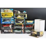 12 Boxed miniature diecast models featuring Corgi Juniors and Johnny Lightning, all contained within