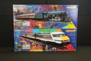 Two boxed Hornby OO gauge electric train sets to include R1001 Flying Scotsman and R824 Intercity