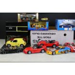 Around 40 diecast models to include 5 x boxed examples (3 x Burago - 3025, 1565, 0116, a