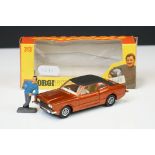 Boxed Corgi Whizzwheels 313 Ford Cortina GXL diecast model in metallic bronze with Graham Hill