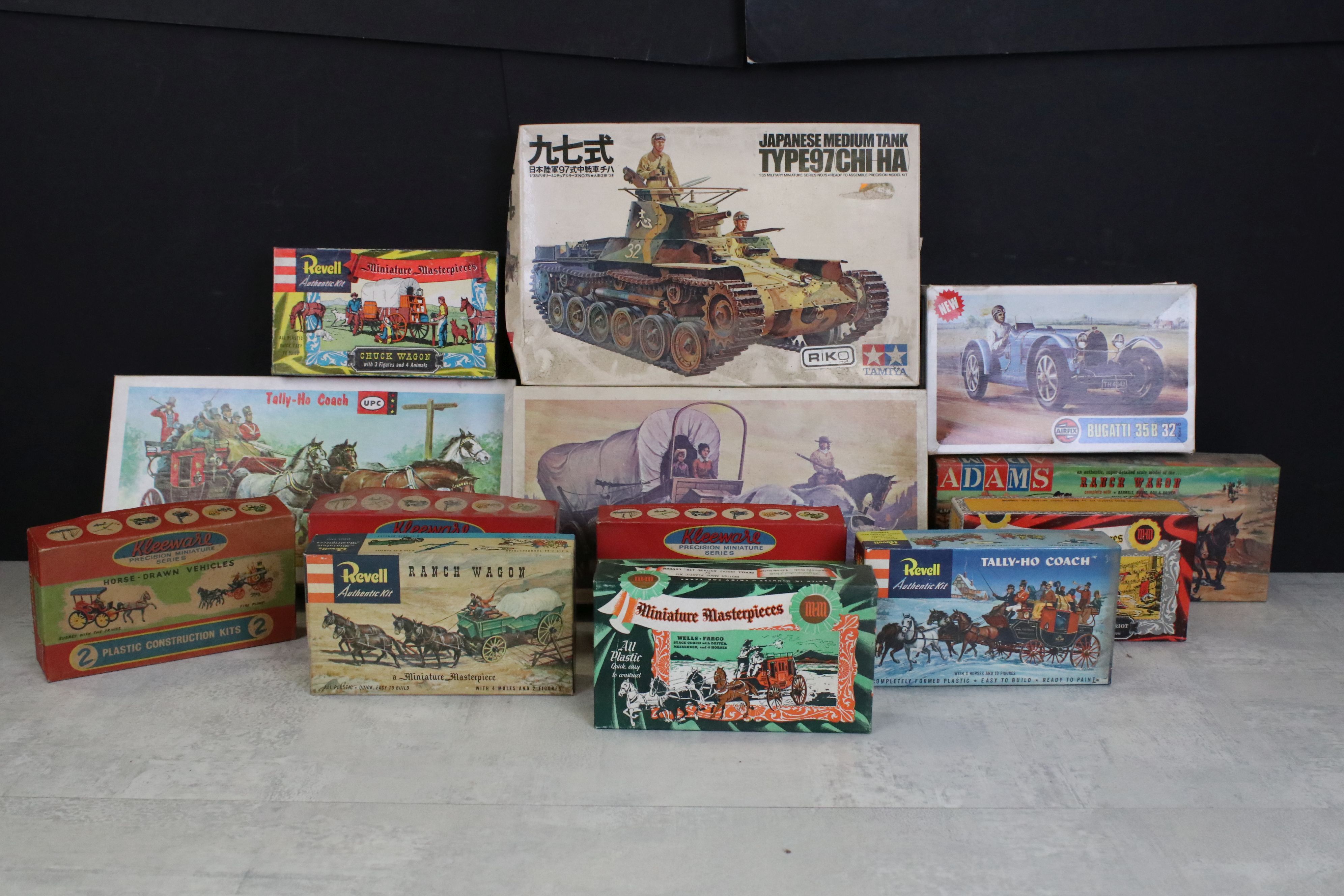 13 Boxed plastic model kits to include 2 x UPC (Tally Ho Coach & Covered Wagon), Tamiya Japanese