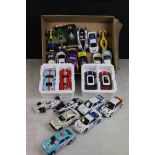 25 Scalextric slot cars to include F1, Mini's, Ford GT 40 two pack in original polystyrene etc