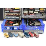 Over 90 OO gauge items of rolling stock to include wagons, trucks, tankers and coaches featuring