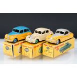 Three boxed Dinky diecast models to include 158 Riley Saloon in cream, 157 Jaguar XK120 Coupe in