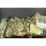 A Collection Of Mainly British / Nato Uniform To Include Trousers, Jackets And Shirts.