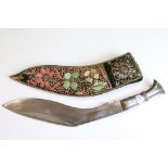 An Indian Kukri knife With Aluminium Handle and Decorative Embroidered Scabbard.