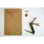 A Small Collection Of Mixed Militaria To Include A Wiltshire Regiment Book 'With The 2/4th Wilts
