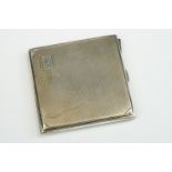 Art Deco silver cigarette case with engine turned decoration, gilt interior, engraved monogram,