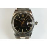 Gents Rolex Oysterdate Precision watch. Black dial with magnified date aperture at 3 o'clock.