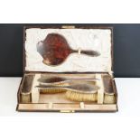 Goldsmiths & Silversmiths Co Ltd - George V silver & tortoiseshell cased five-piece dressing table