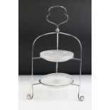 Silver cake stand with three scroll feet, two frosted cut glass dishes, makers Cooper Brothers &