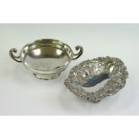 Late Victorian silver bon bon dish with pierced & embossed scrolling decoration, of oval form,