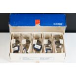 Casio branded trade box containing four Casiotron watches ref R-17B-2 (3 blue and 1 deep blue) and