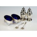 Mappin & Webb silver salt & pepper pots of footed baluster form (London 1904, 10cm high), together