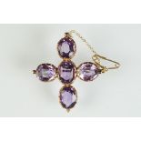 19th century amethyst rose metal brooch, five oval mixed cut amethysts, rubover claw set,