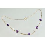 Early 20th century amethyst 9ct yellow gold necklace, five round faceted amethyst beads, diameter