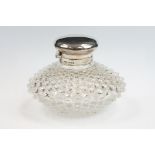 Late Victorian silver mounted cut glass dressing table bottle, of squat form with a hobnail cut