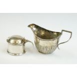 Silver drum mustard pot, plain polished, blue glass liner, makers Harrods Ltd, Birmingham 1935;