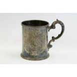 Mid Victorian silver footed mug, engraved floral and scroll decoration with later engraved