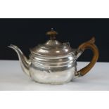 Edwardian silver bachelors teapot, of boat-shaped form, with scrolling fruitwood handle & finial,