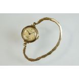 Vertex 9ct yellow gold cased ladies wristwatch, gold-colour face, seconds dial, black Arabic