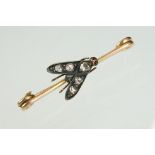 Late 19th century diamond and garnet unmarked yellow gold and silver bar brooch modelled as a fly,