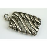 Late Victorian silver vesta case of reeded form, with scrolling foliate bands, hallmarked Birmingham