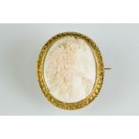 19th century pale pink and white cameo yellow metal brooch, possibly coral, the female profile