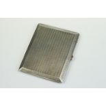 Art Deco Silver cigarette case with engine turned decoration, gilt interior with presentation