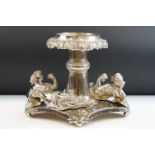 Plated pedestal stand centrepiece, Bacchanalian, two cast reclining women holding a wine glass and