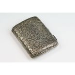 Edwardian silver cigarette case with heavily chased floral & foliate decoration, silver openwork