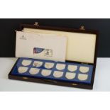 Danbury Mint ' The Royal Arms ' set of 12 proof silver ingots, produced in celebration of Queen