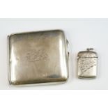 George V silver cigarette case of curved plain polished form, engraved initials to front, gilt