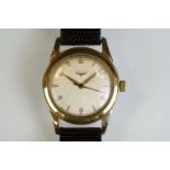 Gents Longines 34mm manual wind watch. Rose metal case, replacement case back, replacement strap