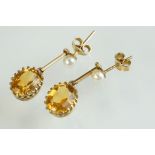 Pair of early 20t century pearl and citrine 9ct yellow gold drop earrings, the oval mixed cut