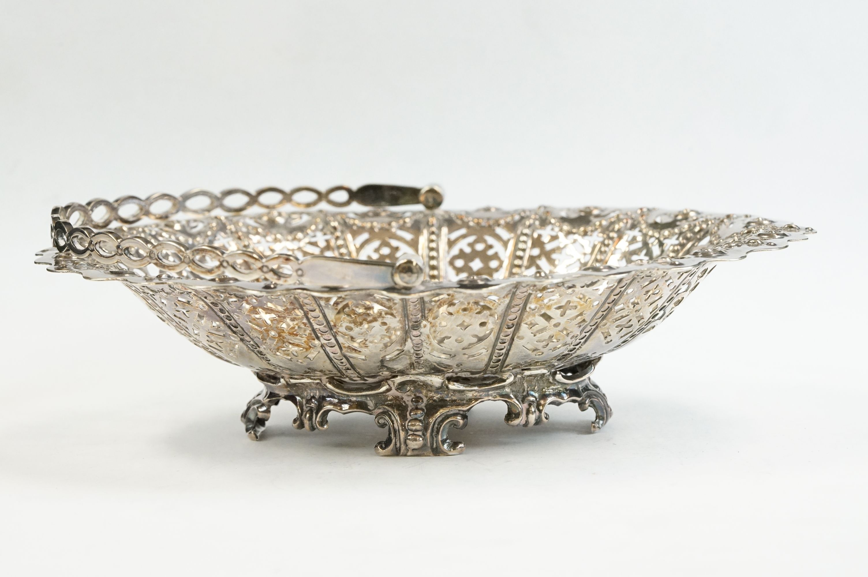 Victorian silver swing handled bon bon dish, pierced body, repoussé foliate and flower head - Image 6 of 6